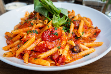 tasty pasta Italian tomato sauce pasta on the table