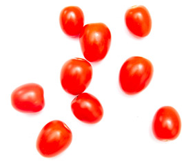 Red cherry tomatoes on a white background