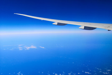 Fototapeta na wymiar Airplane wing over the Black Sea