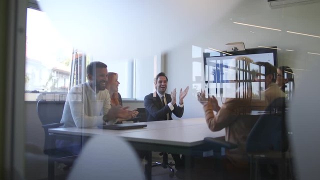Successful business team brainstorming on meeting in creative office