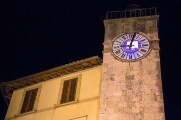 Night view of the tower of the municipality of Chianciano, in the province of Siena, Italy.