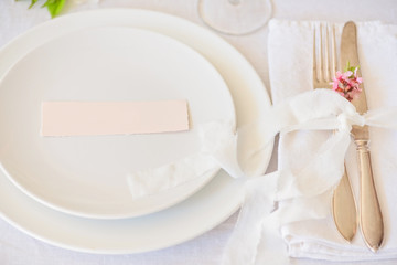 Dishes and cutlery, boho wedding table setting