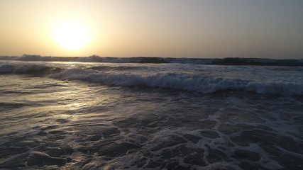 Fototapeta premium landscape and sunset on the Atlantic coast watching the breaking of the waves