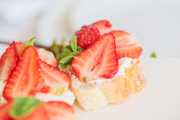 Bruschetta with strawberry and cheese cream