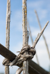 rope tied around fence