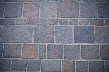 Top view of brick paving stones on a sidewalk background texture