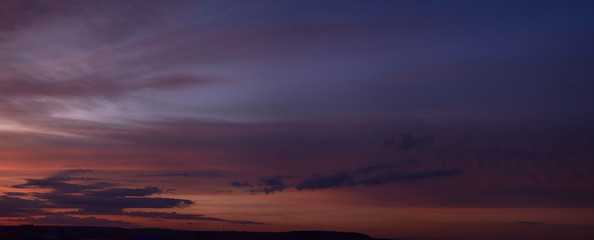 Fototapeta na wymiar Evening, summer sunset. Panoramic photo, late afternoon, alarming, red sunset.