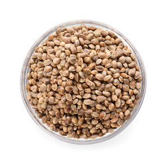 Glass bowl of hemp seeds on white background, top view