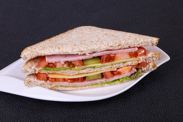 Club sandwich with ham and cheese