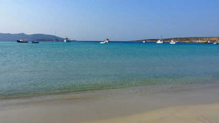 Photo of famous sandy turquoise beach of Ammos near main port of Koufonisi island, Small Cyclades, Greece