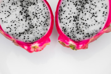 Dragon fruit. Vibrant Dragon Fruit on white background. Sliced white dragon fruit or pitaya on...