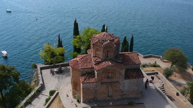 Saint John Kaneo Orthodox Church on Cliff Over Ohrid Lake North Macedonia, Pull Back Aerial