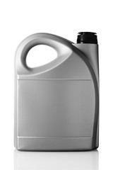 Gray plastic canister of motor oil on a white isolated background close-up.