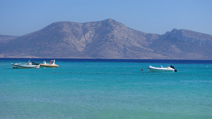 Obraz premium Photo of famous sandy turquoise beach of Ammos near main port of Koufonisi island, Small Cyclades, Greece