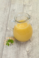 Dietary vegetarian oats milk over wooden