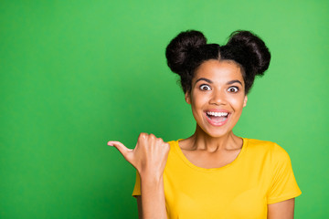 Closeup photo of amazing dark skin lady in shopping mood directing finger on sale prices not...