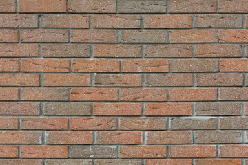cracked brick wall of various colors and sizes
