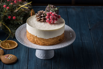 Double cheesecake with berries on a dark background