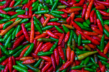 Group of Red Hot chili pepper at black background
