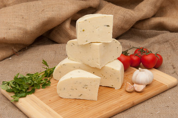 Cheese with vegetables and herbs