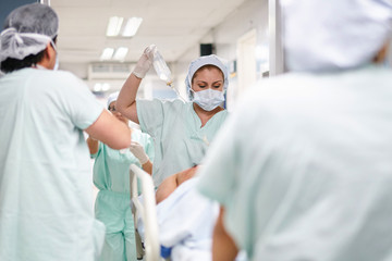 Ambulance brings in a patient for urgent operation