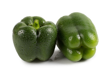 Two fresh bell peppers, big green wet in drops, perfect isolate on a white background.