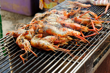 Grilling Giant River Prawn on charcoal sell at street market