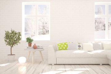 Stylish room in white color with sofa and winter landscape in window. Scandinavian interior design. 3D illustration