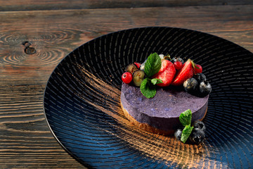 View from above of delicious cheesecake with blueberry