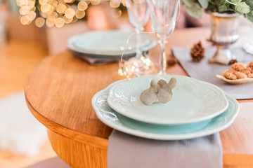 Christmas table, a glass of champagne, table setting