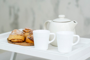 Fototapeta na wymiar Morning homemade Breakfast in a beautiful bright interior.