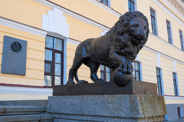 Naklejka premium VELIKY NOVGOROD, RUSSIA - APRIL, 2019: Lion sculpture on the porch of the Historical Museum in the Novgorod Kremlin