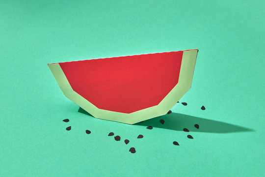 Handcraft paper piece of a healthy watermelon fruit with seeds o