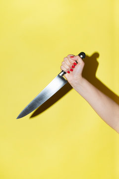 Hand with a knife