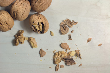 cracked nut isolated on a wood background