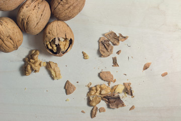cracked nut isolated on a wood background