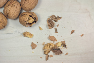 cracked nut isolated on a wood background