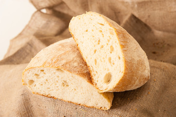 white bread on burlap background