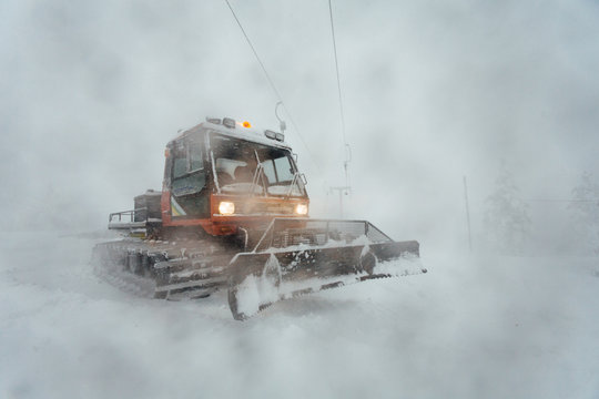 Ski ratrak on heavy snow