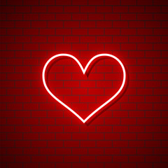 Obraz na płótnie Canvas neon love on brick wall