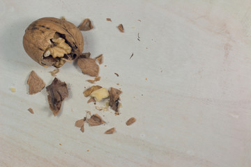 cracked nut isolated on a wood background