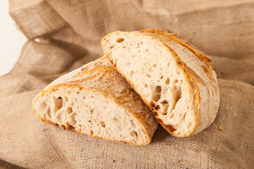 white bread on burlap background