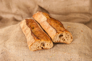 french baguette on burlap background