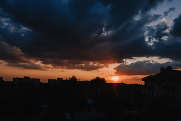 Colorful clouds on sunset sky, nature background