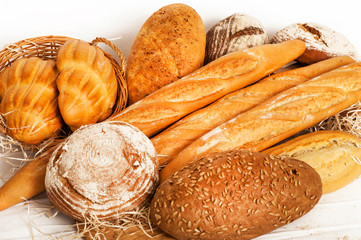 Several types of bread on white background