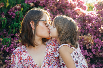 Young mum and daughter having a cuddle