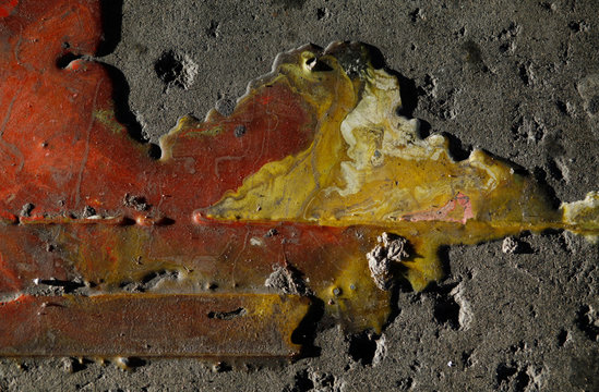 dried paint on old concrete floor