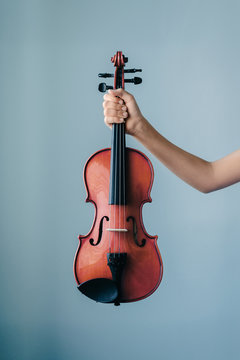 violin in hand