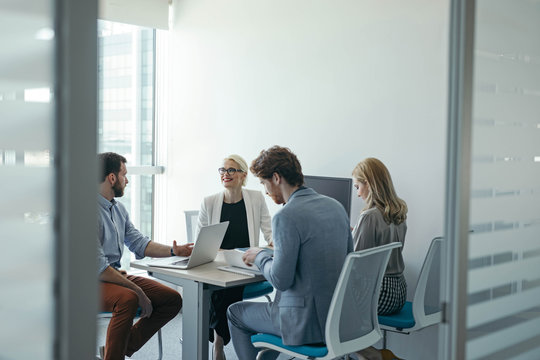 Group of Businesspeople Having a Meeting