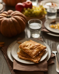 Pumpkin pie on a festive autumn table